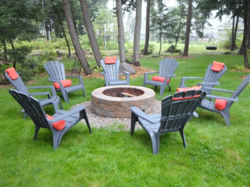 fire pit area and adirondack chairs
